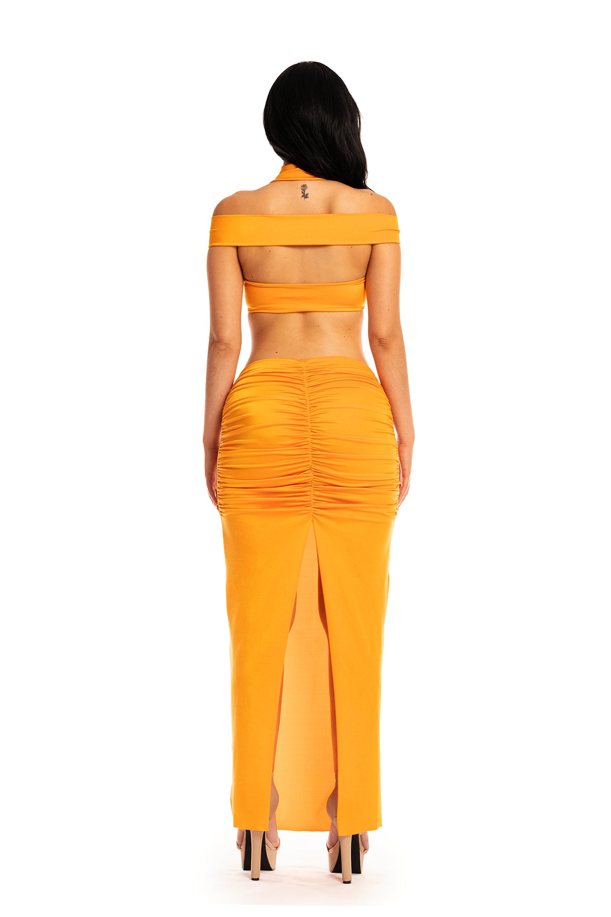 Chic off-shoulder top with flowing maxi skirt