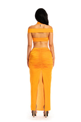 Chic off-shoulder top with flowing maxi skirt